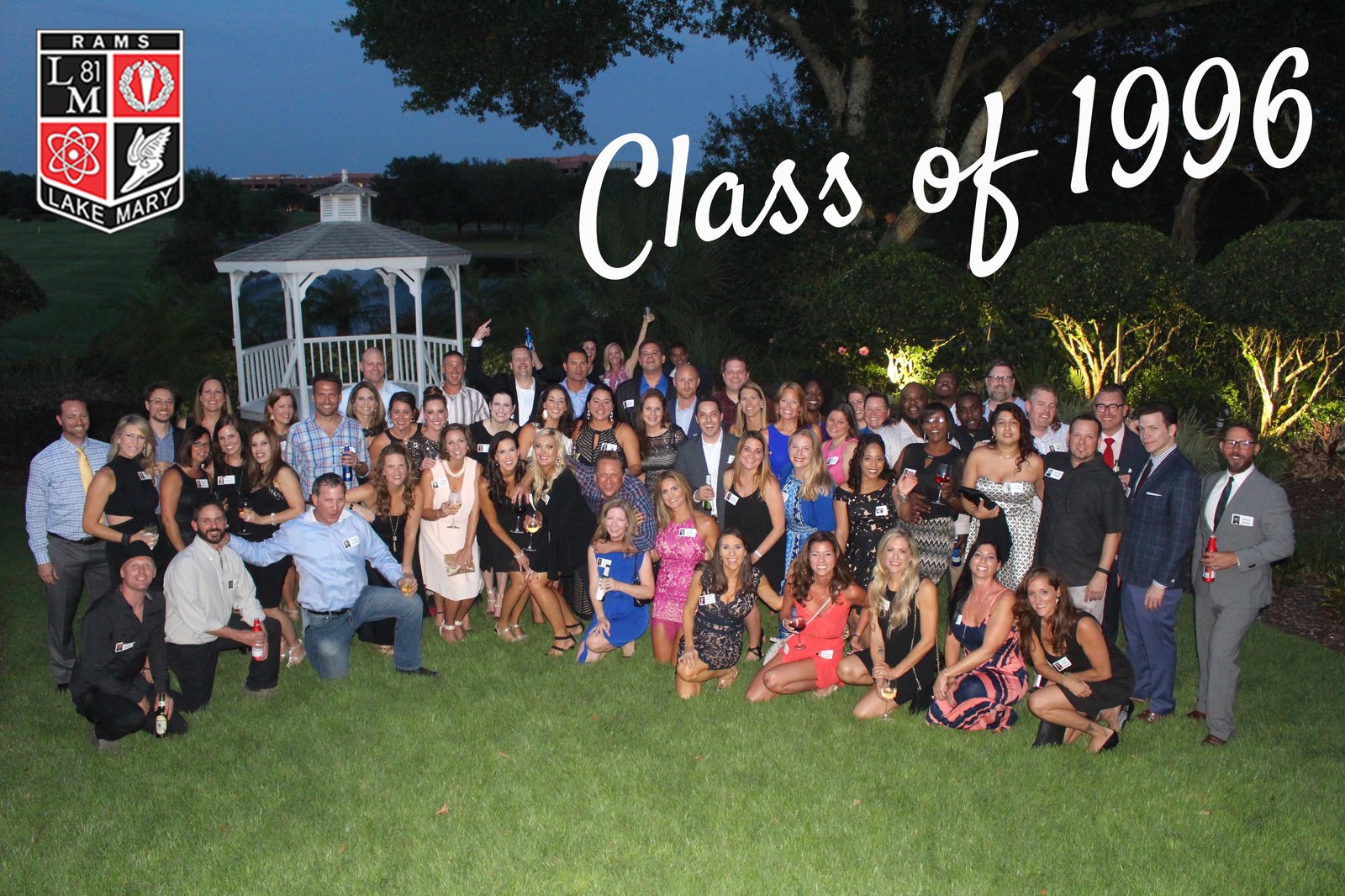 Lake Mary High School Class of 1996 group photo at a past reunion, with the LMHS Rams crest and 'Class of 1996' script overlay